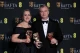 На фото: Емма Томас і Крістофер Нолан зі статуетками BAFTA
